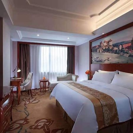 Vienna International Hotel Shaoguan Fengcailou Bagian luar foto