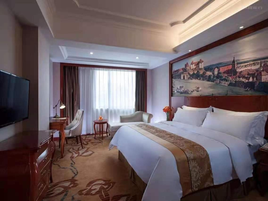 Vienna International Hotel Shaoguan Fengcailou Bagian luar foto